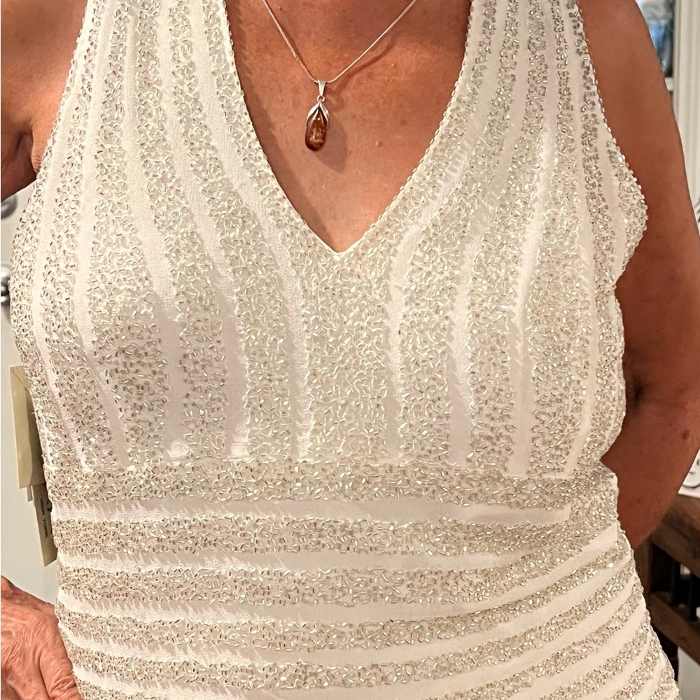 Brand new jK ARA top. White with silver beading.. Perfect for the Holidays!